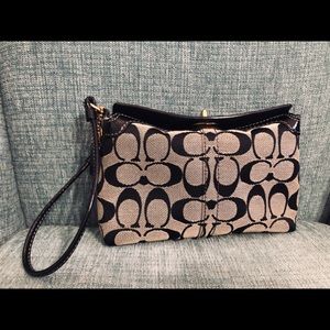 Coach signature canvas wristlet/hand bag